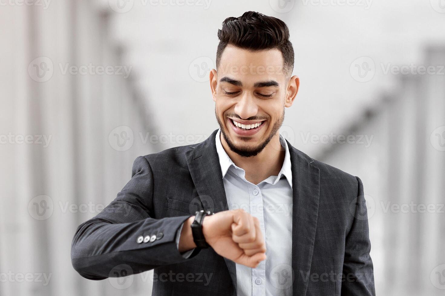 Going To Flight. Arab Businessman Walking With Suitcase In Airport And Looking At Wristwatch, Handsome Middle Eastern Male Traveller Checking Departure Time On Watch, Ready For Air Trip, Copy Space photo