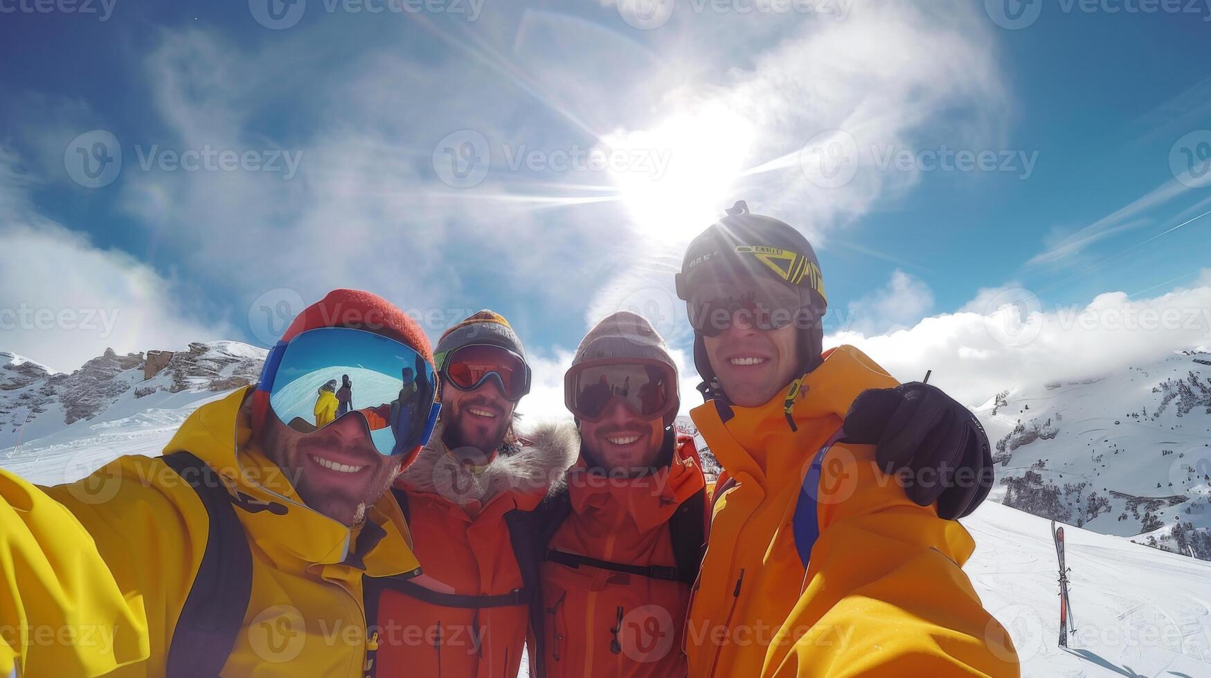 Friends dressed in colorful winter gear take a group selfie on a sunny day, celebrating their skiing adventure at a beautiful snowy mountain peak. photo