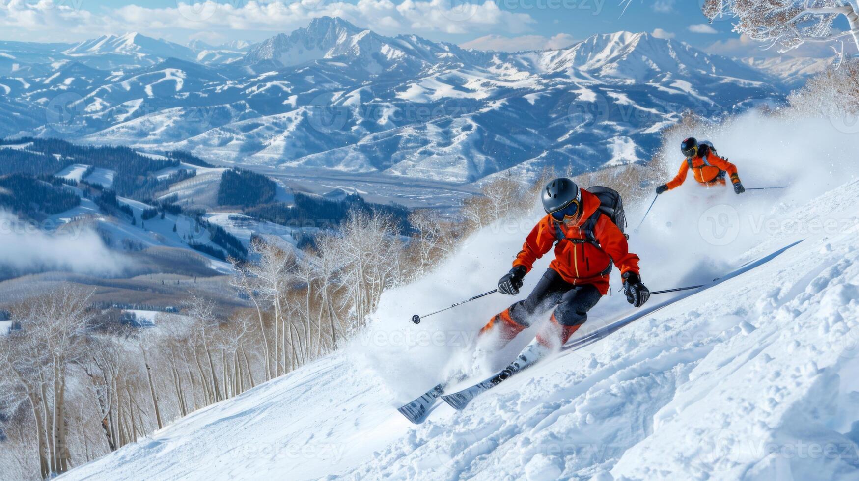 Two skiers expertly carve through fresh snow on a mountainside, surrounded by stunning peaks and a vibrant winter landscape with scattered trees. photo