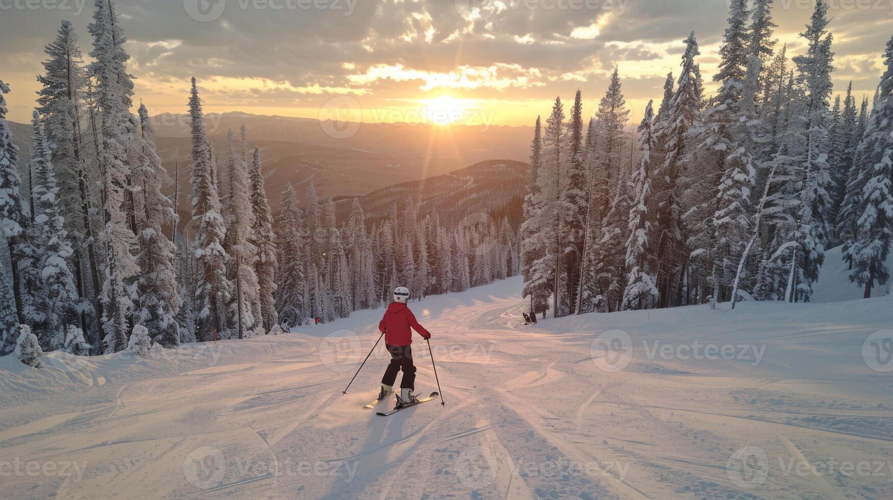 A skier gracefully navigates down a snowy slope surrounded by towering pine trees at dusk, with a breathtaking sunset painting the sky in warm colors. photo