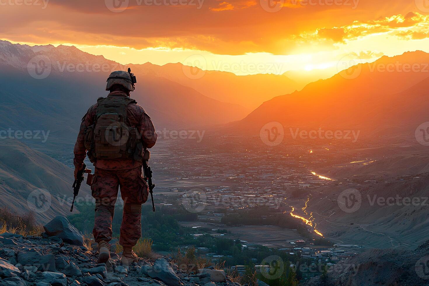 Soldier at Sunset Overlooking Mountain Valley Military Adventure and Exploration photo