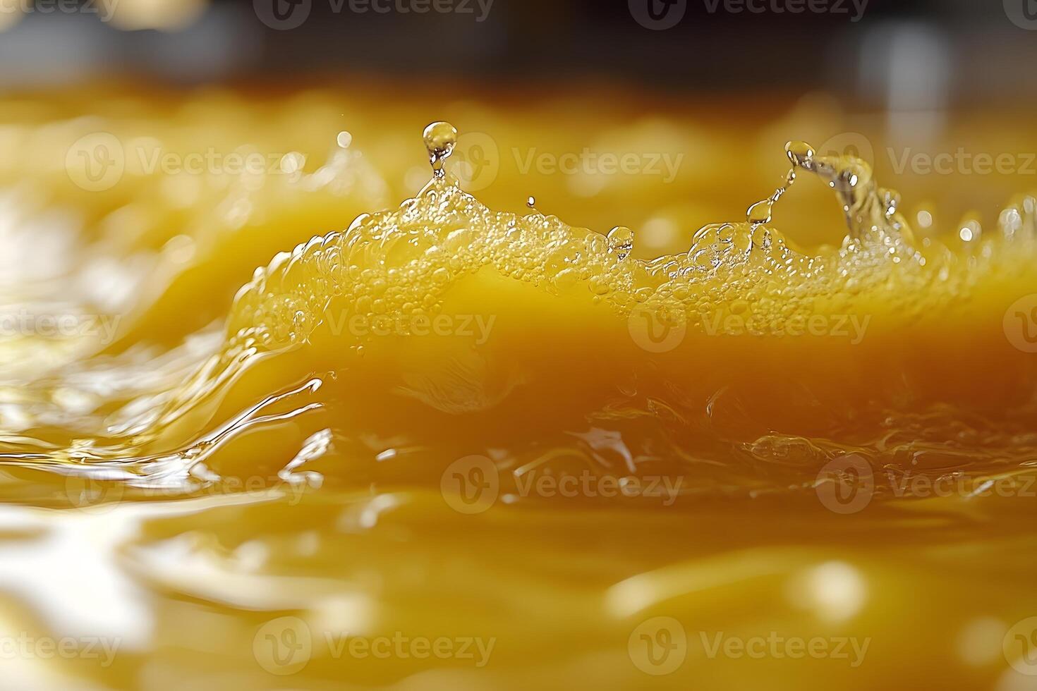 Refreshing Splash of Yellow Liquid for Beverage Advertisement and Visual Design photo