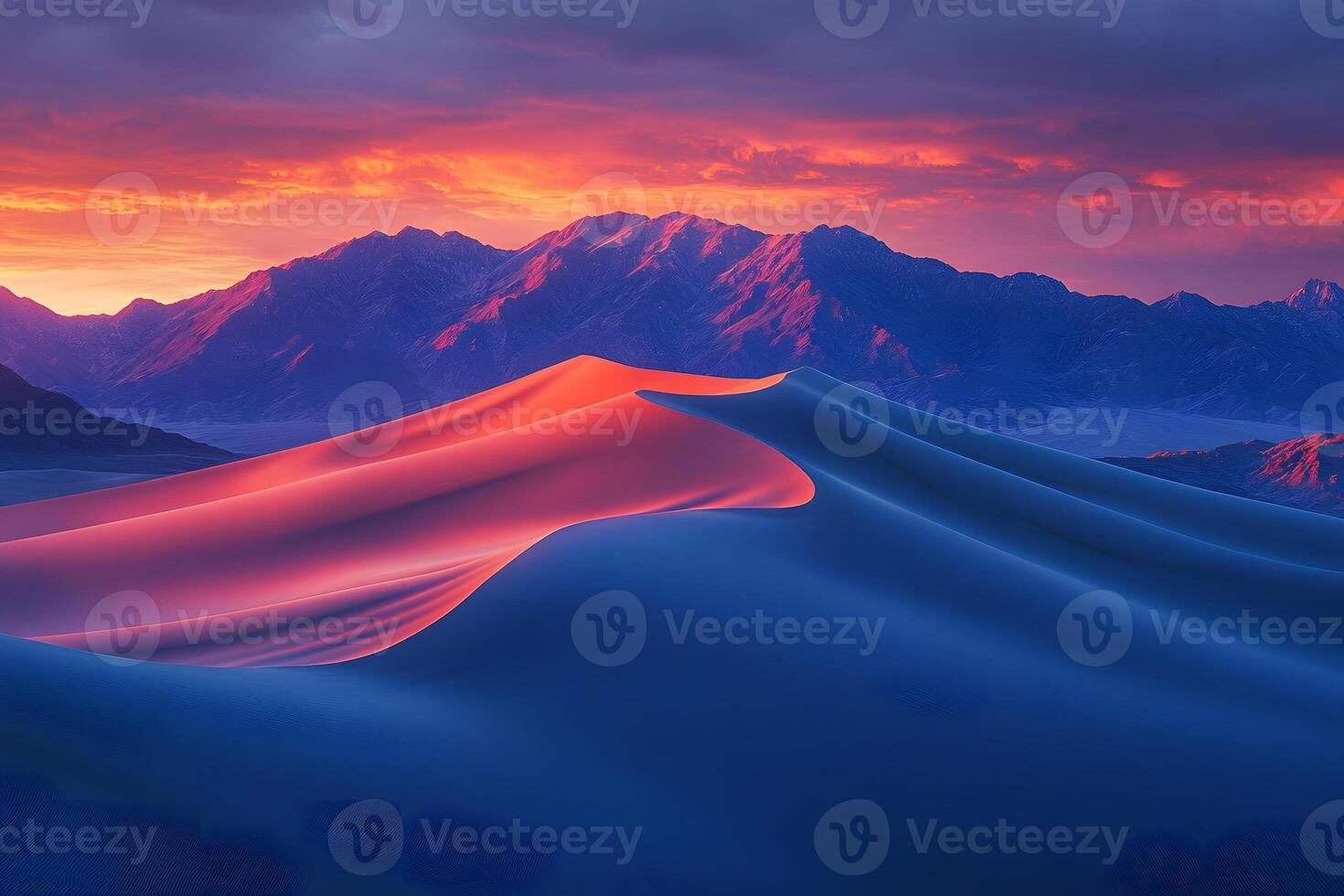 Sunset Over Serene Desert Dunes with Majestic Mountain Backdrop photo