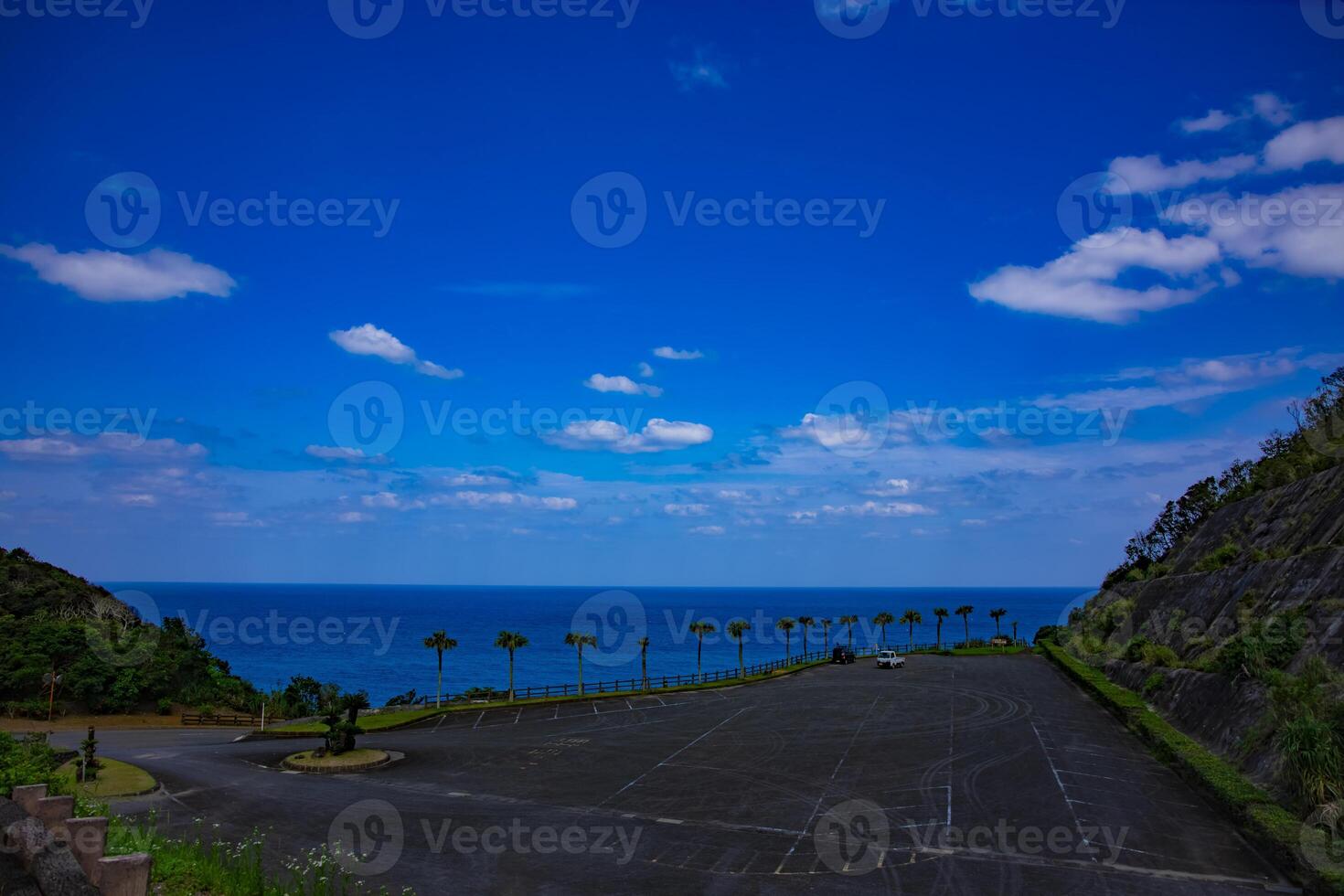 The promontory near the panoramic ocean in Amami oshima wide shot photo