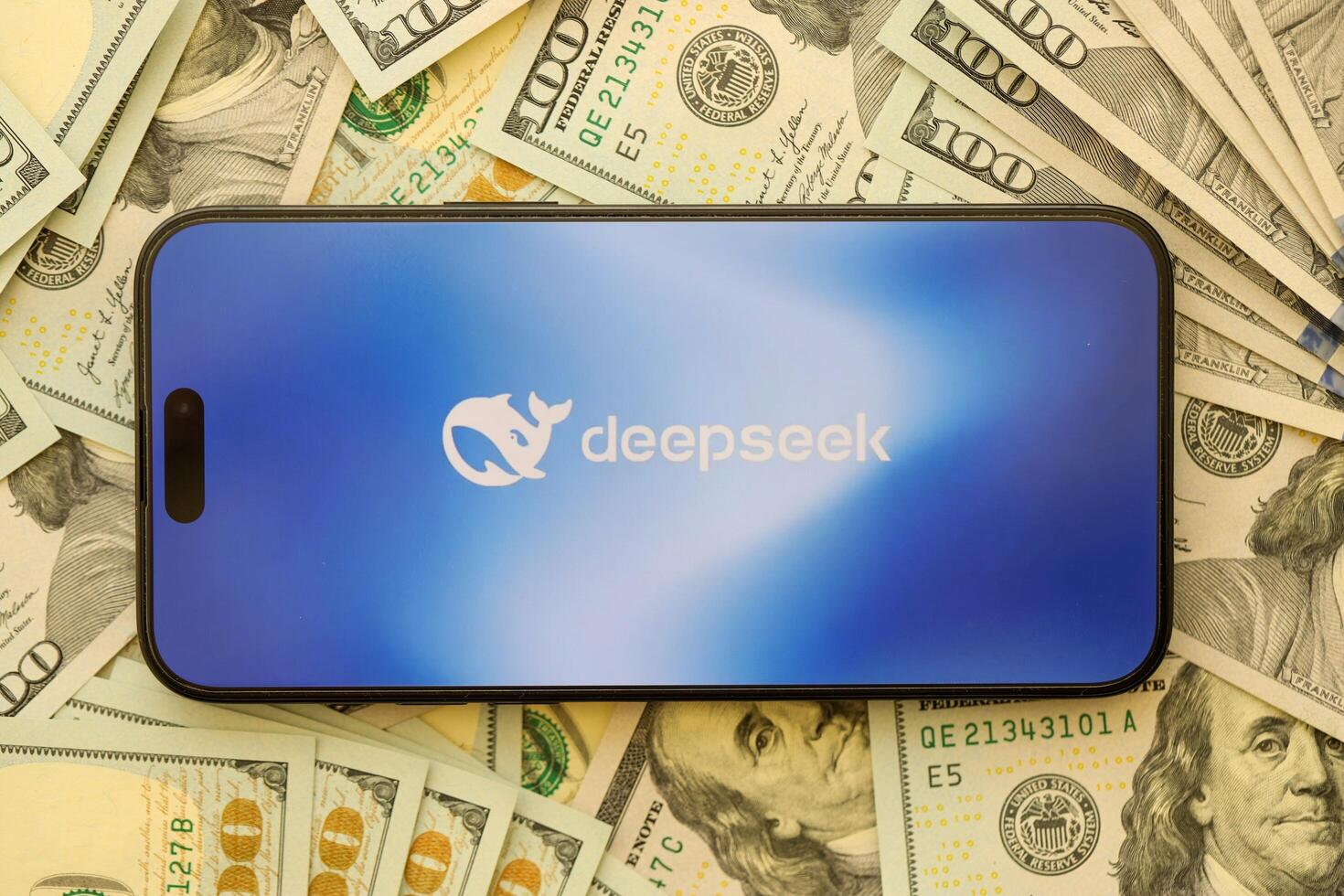 KYIV, UKRAINE - JANUARY 29, 2025 Deepseek AI logo on apple iPhone 15 display screen close up. Modern artificial intelligence photo
