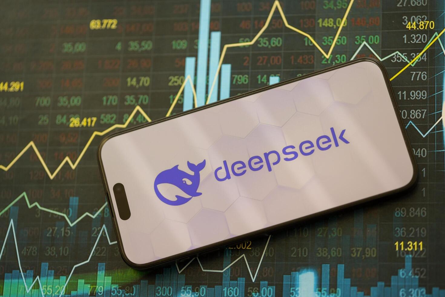 KYIV, UKRAINE - JANUARY 29, 2025 Deepseek AI assistant logo on apple iPhone 15 display screen close up. Modern artificial intelligence photo