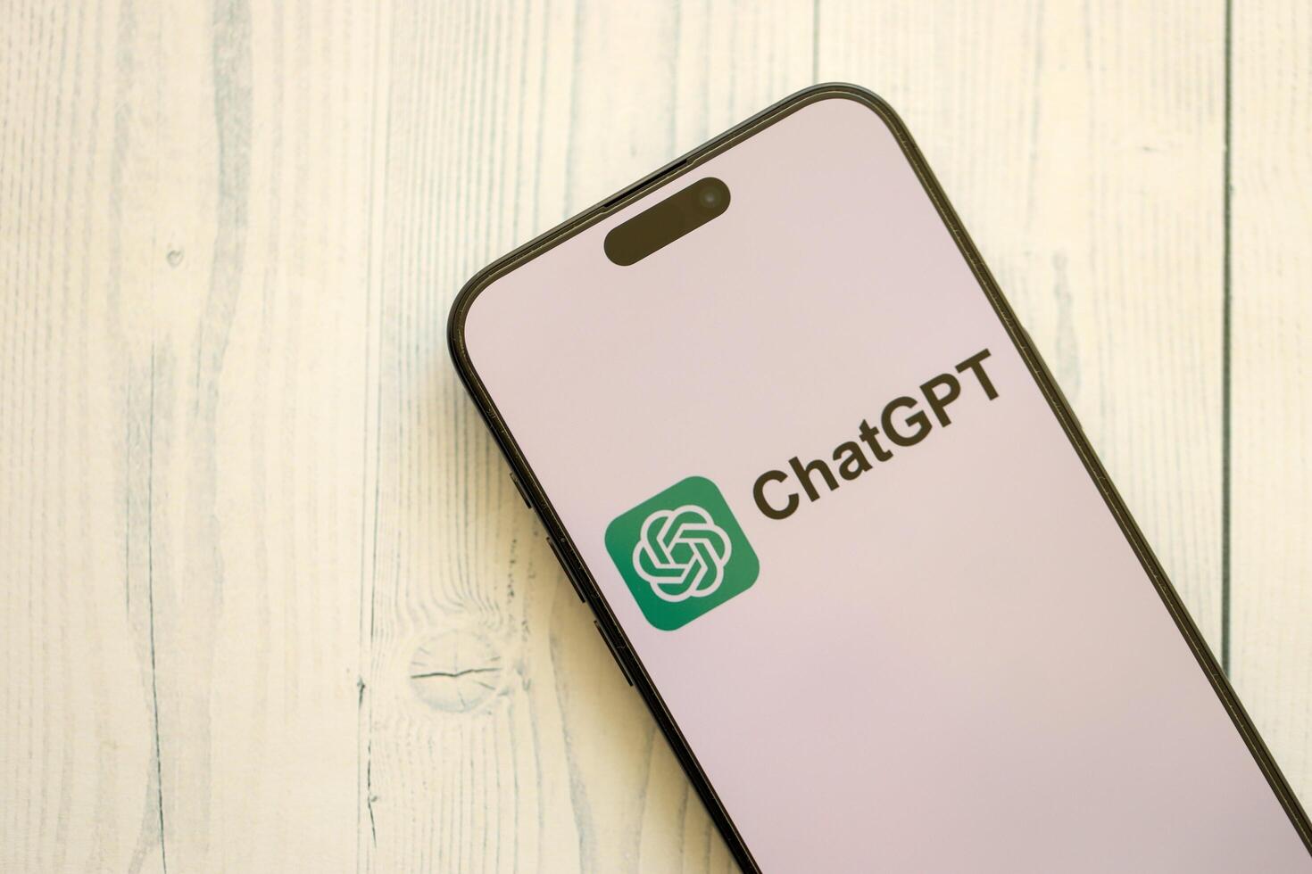 KYIV, UKRAINE - JANUARY 29, 2025 ChatGPT AI logo on apple iPhone 15 display screen close up. Modern artificial intelligence photo