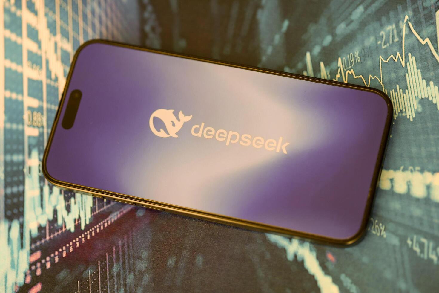 KYIV, UKRAINE - JANUARY 29, 2025 Deepseek AI logo on iPhone 15 display screen close up. Modern artificial intelligence photo