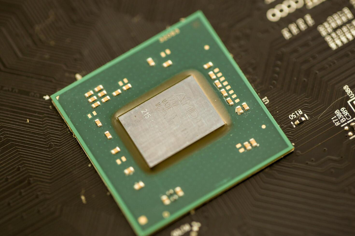 KYIV, UKRAINE - JANUARY 29, 2025 Detail of the processor core of a card AMD Radeon RX550. Graphics processing unit on a latest generation photo