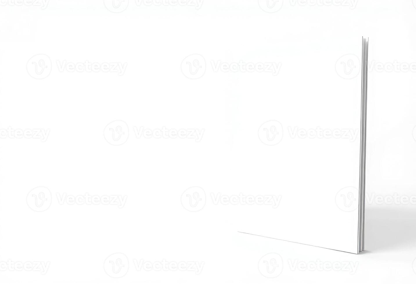 A white mockup of a white magazine, isolated against a plain background photo