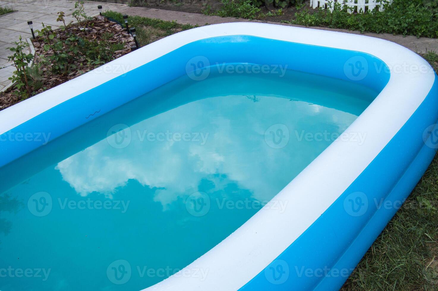 A blue and white pool photo