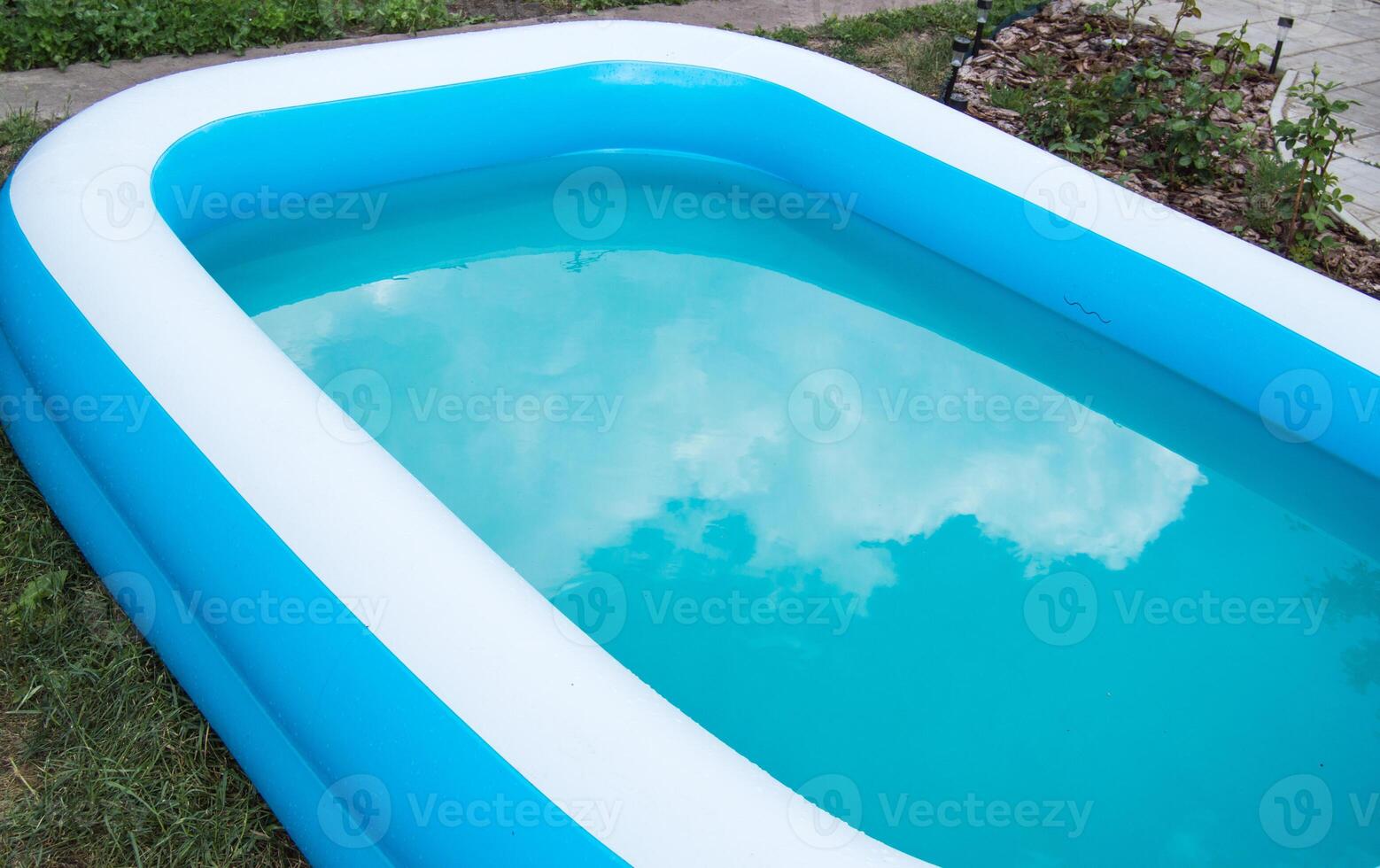 A blue and white pool photo