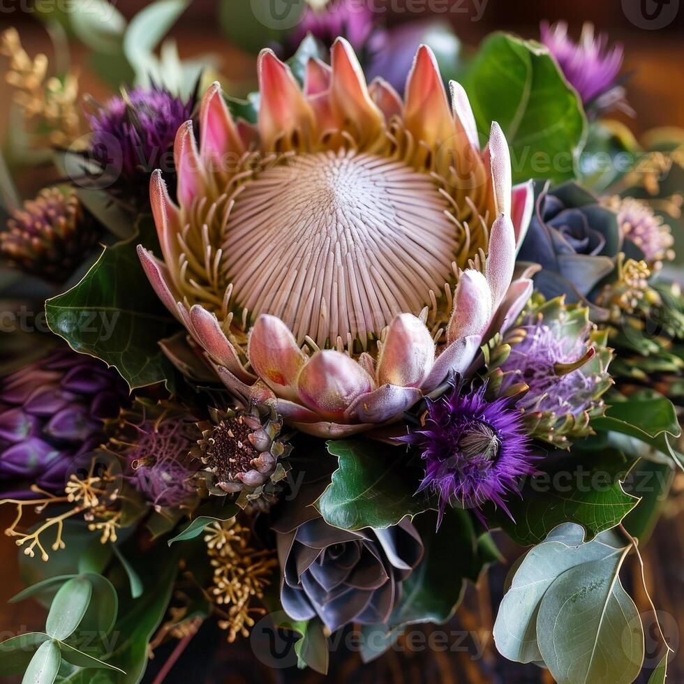 In a sunlit setting, a striking king protea showcases its unique petals, complemented by vivid purple thistles and rich greenery. Nature's artistry shines through in this captivating bouquet photo