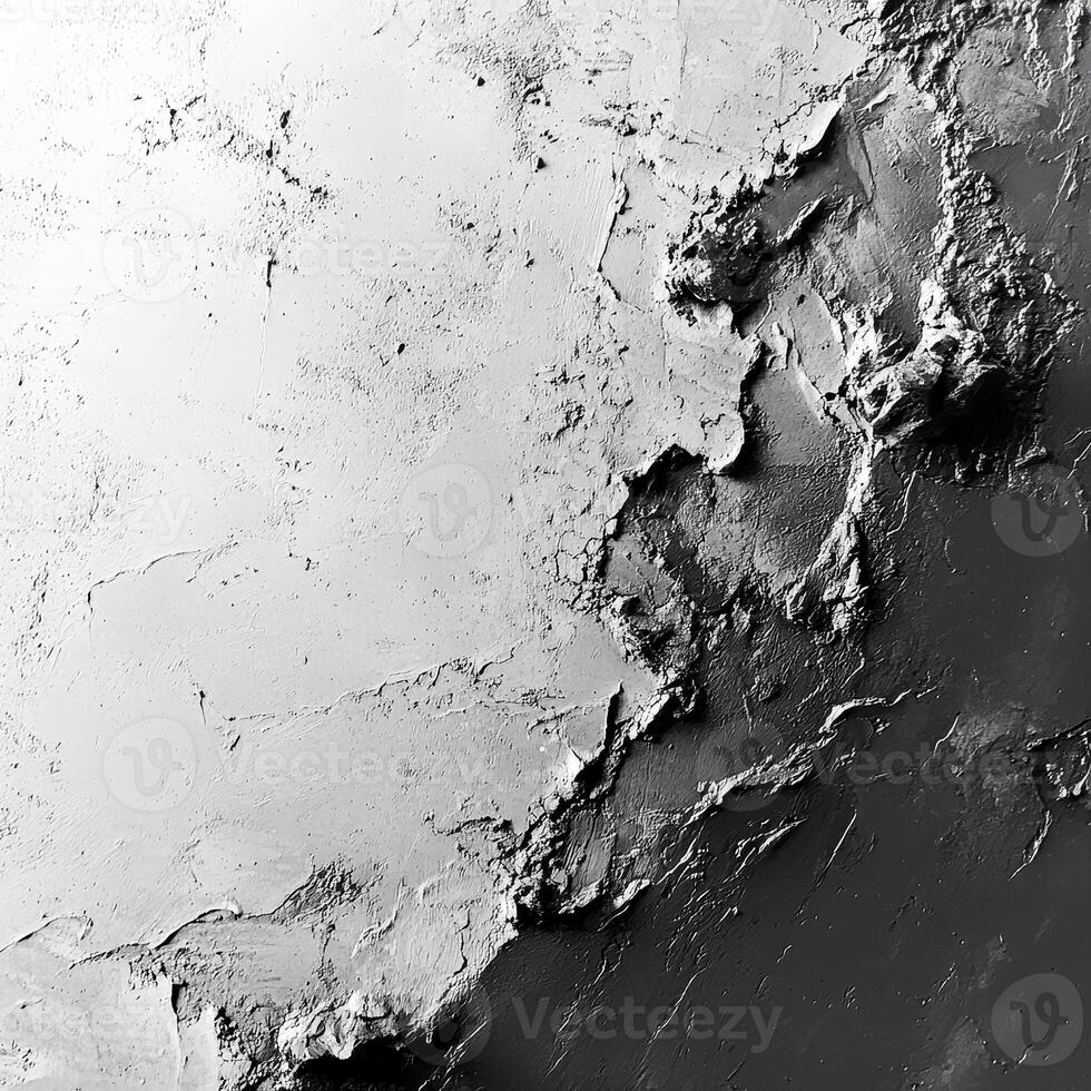 An artistic view of a textured concrete surface showcasing abstract patterns in shades of black and white. The uneven textures create a visually captivating effect, ideal for backgrounds photo