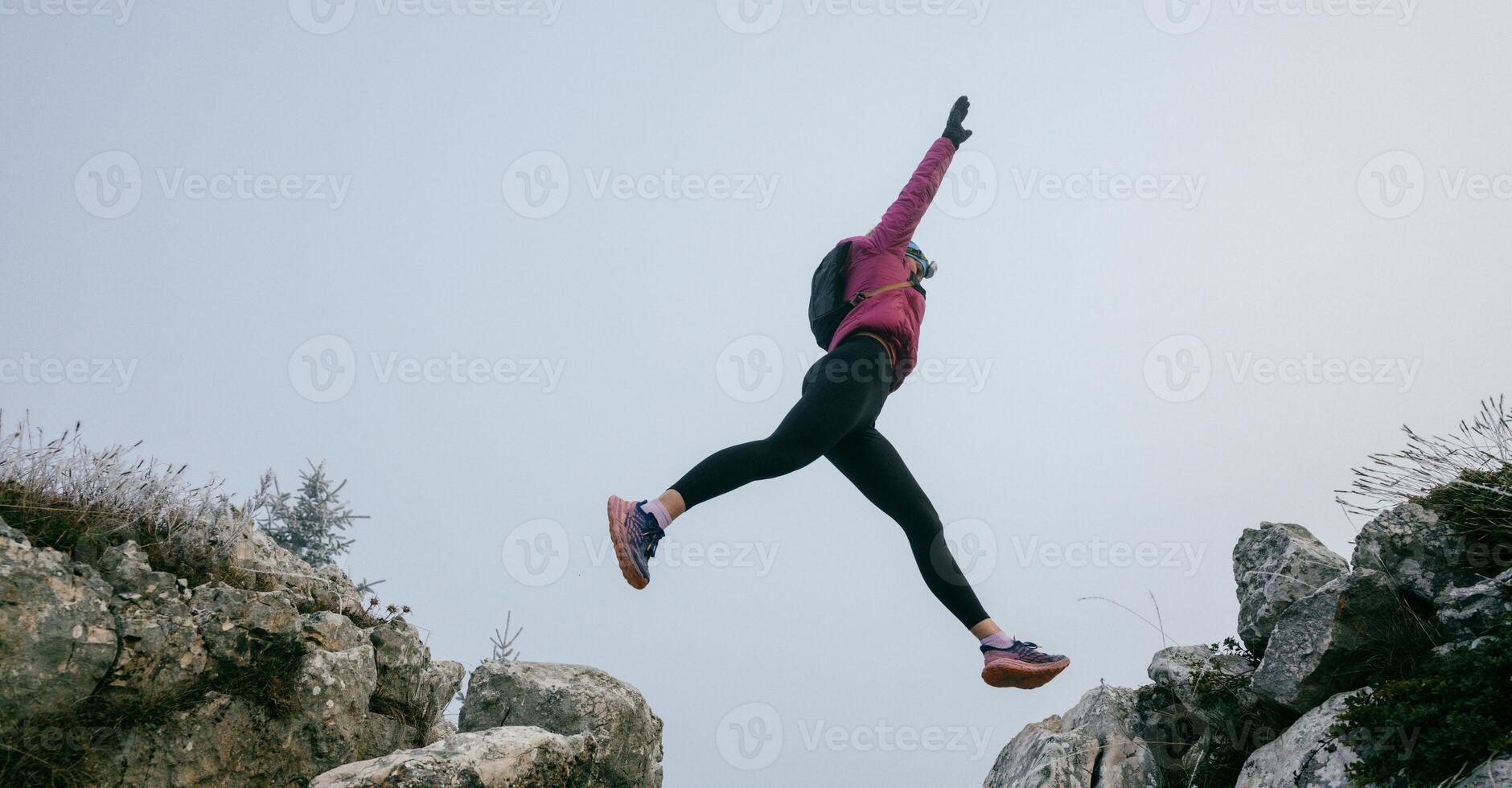 Trail Runner in Misty Mountain Landscape photo