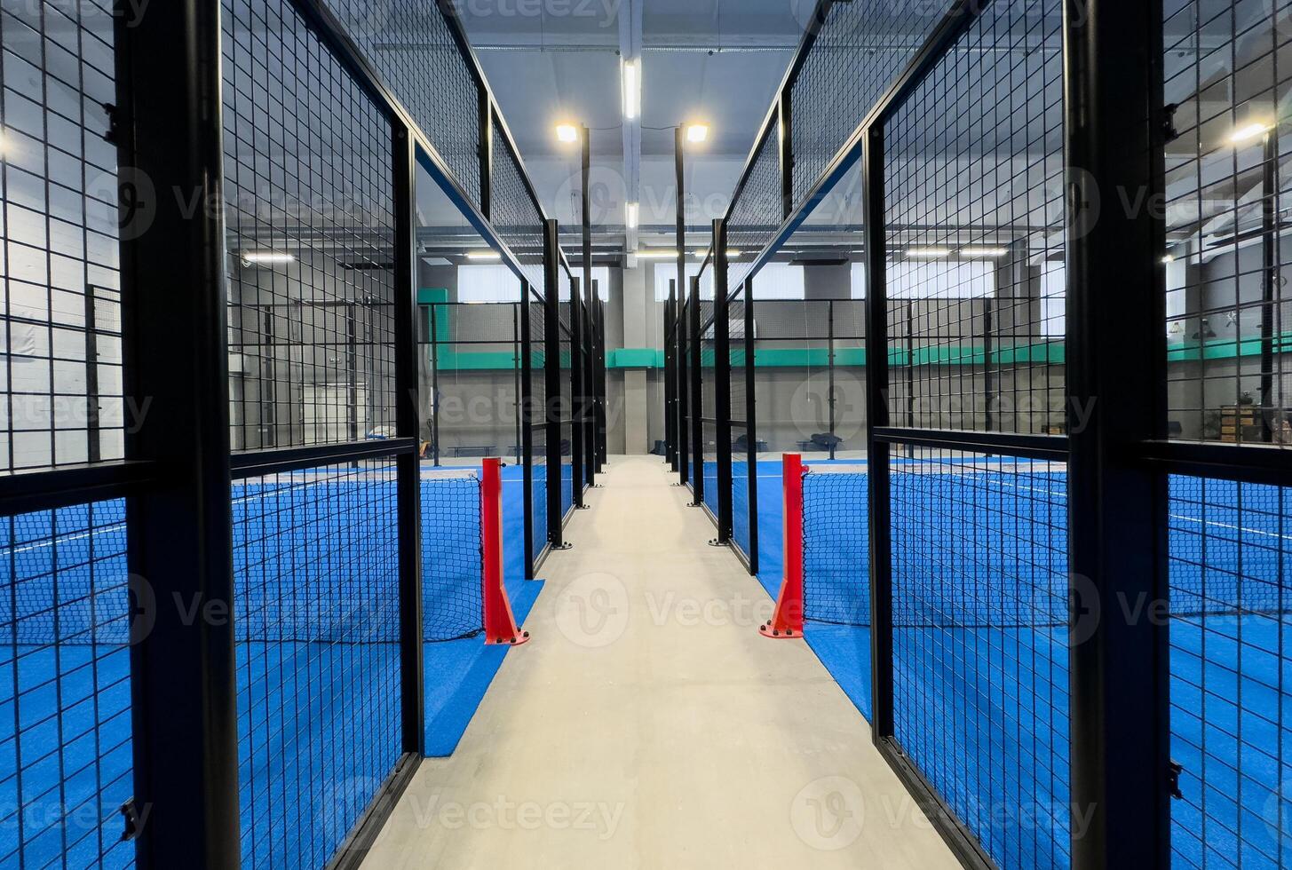 Padel court with lines and net indoor photo