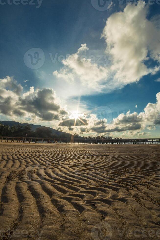 Sand dune in sunset time photo