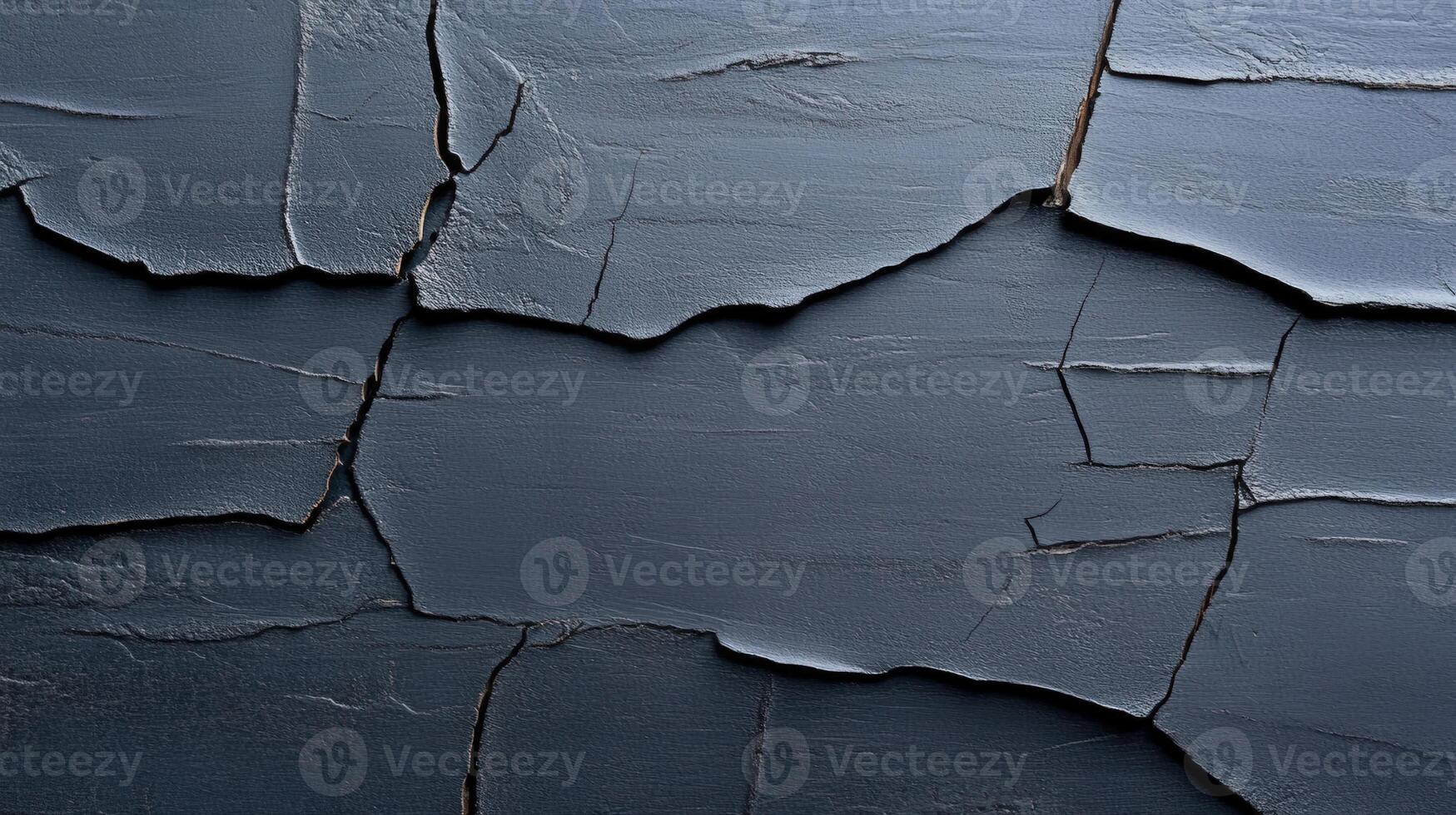 Textured gray surface with elegant cracks, showcasing beauty in imperfection and vintage aesthetics. photo