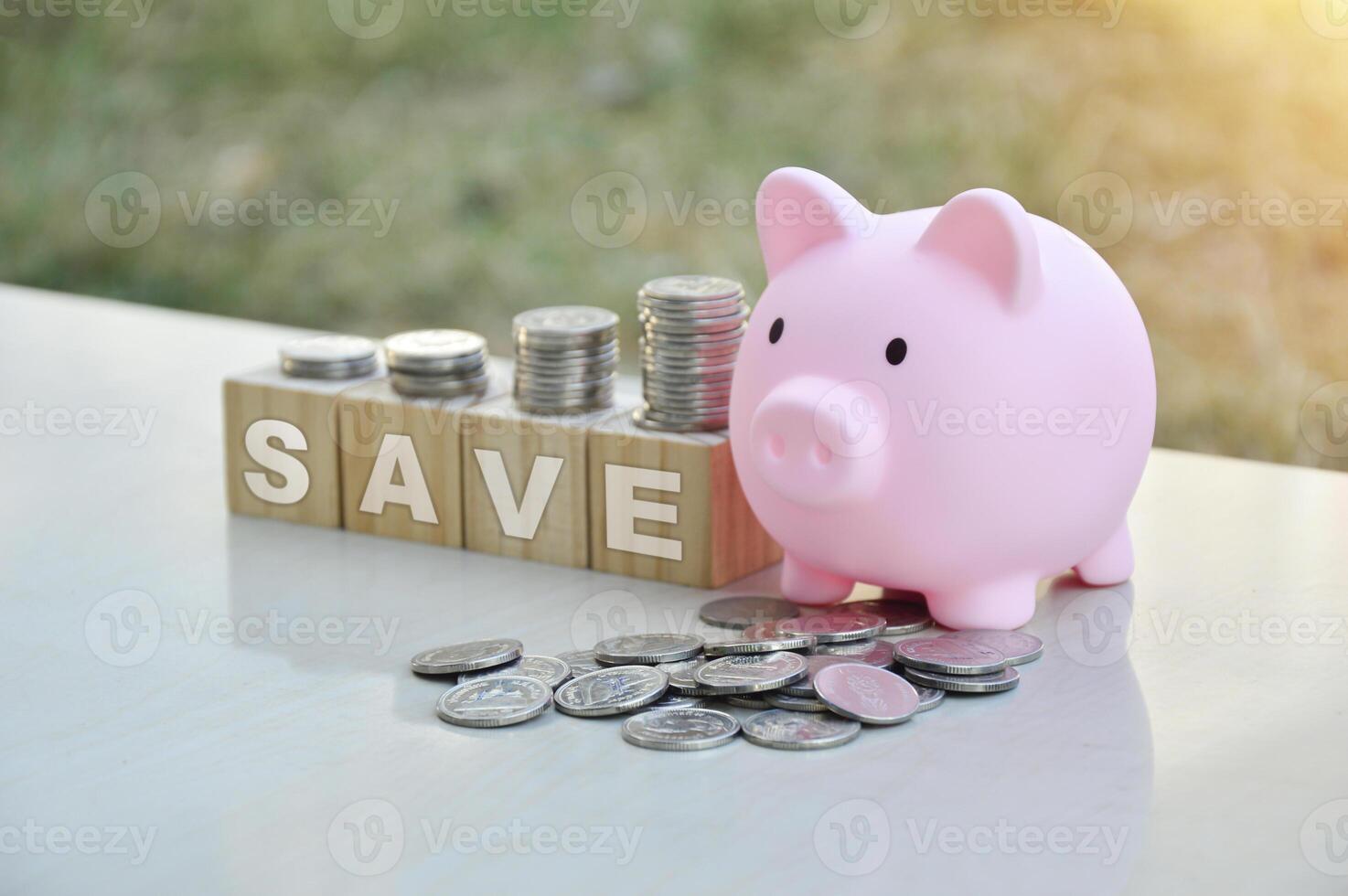 Piggy bank and coins saving and investment photo