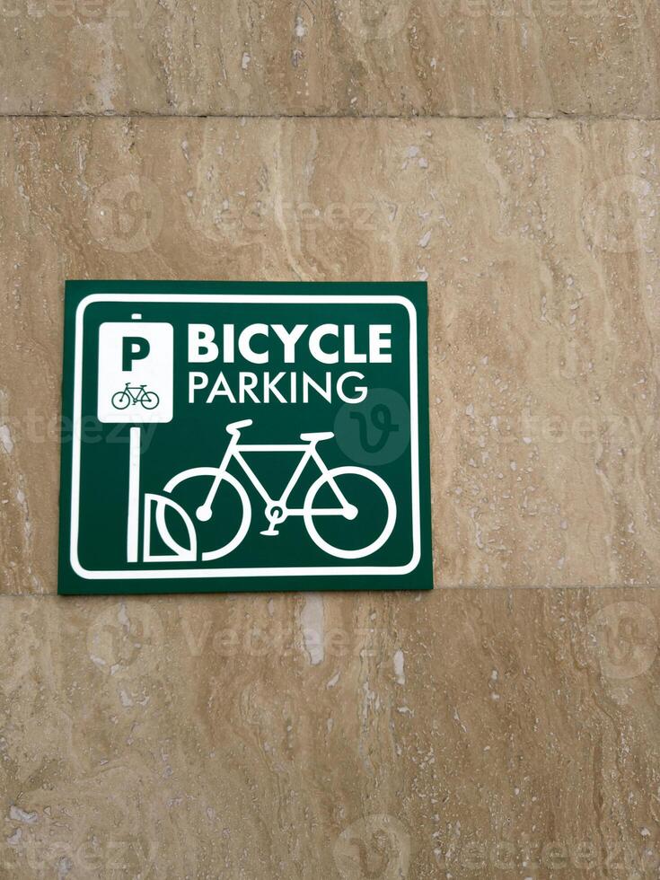 Vertical photography of bicycle parking sign photo