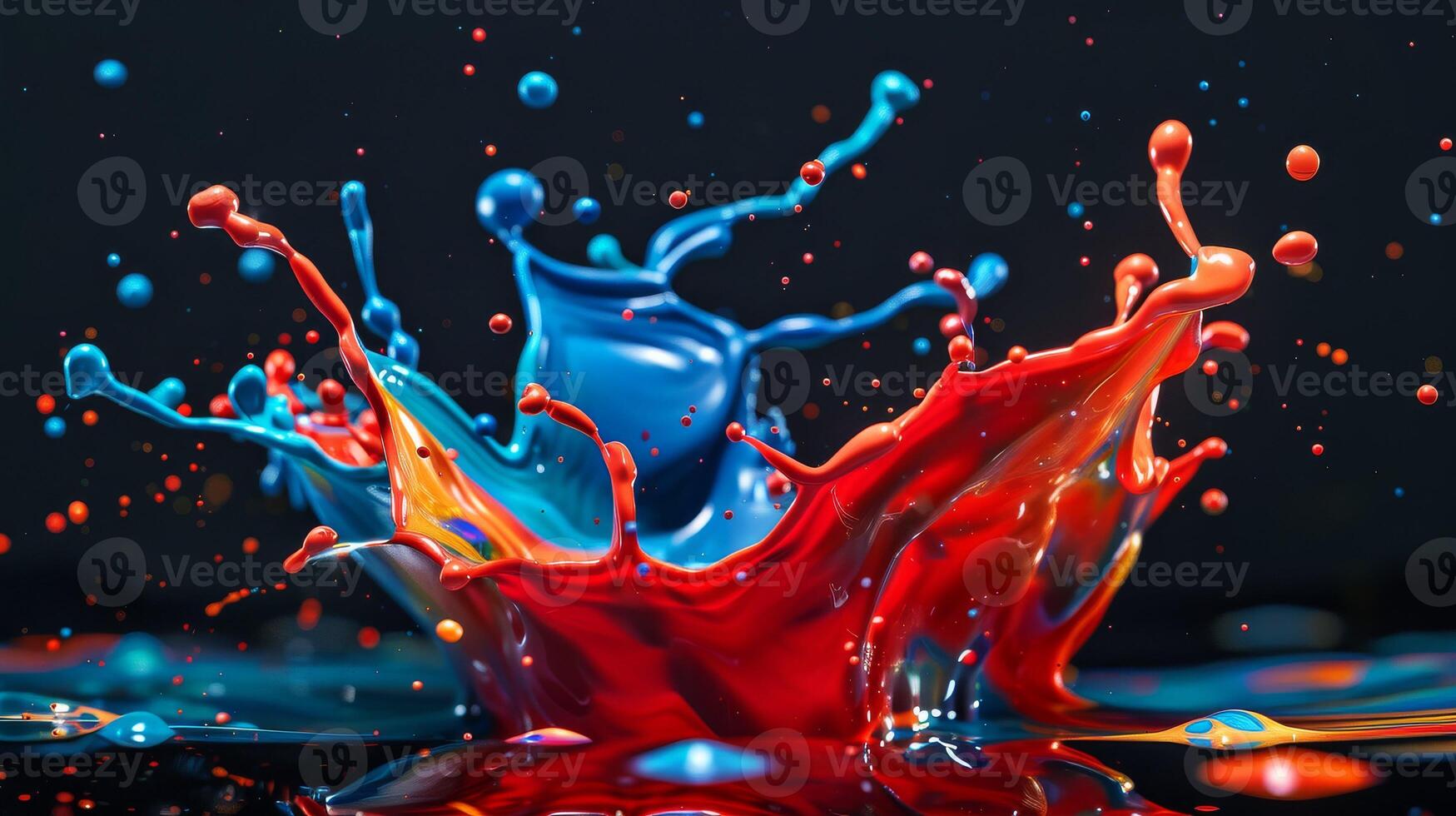 Colorful splash of paint on black background photo
