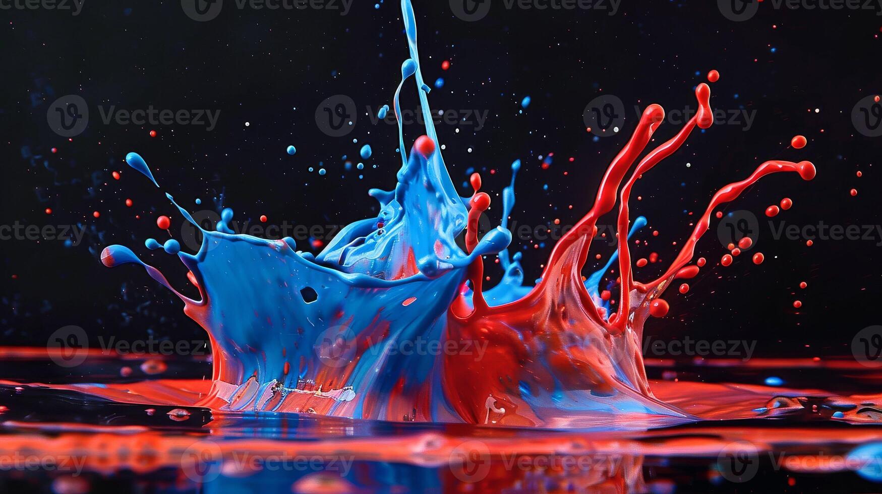 A red and blue liquid splash on a black background photo