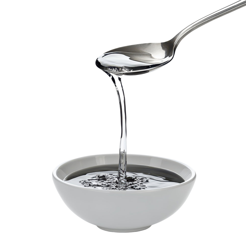 Liquid gracefully pours from a spoon into a white bowl creating a smooth surface, spoon with liquid pouring out it in a bowl, Transparent background png