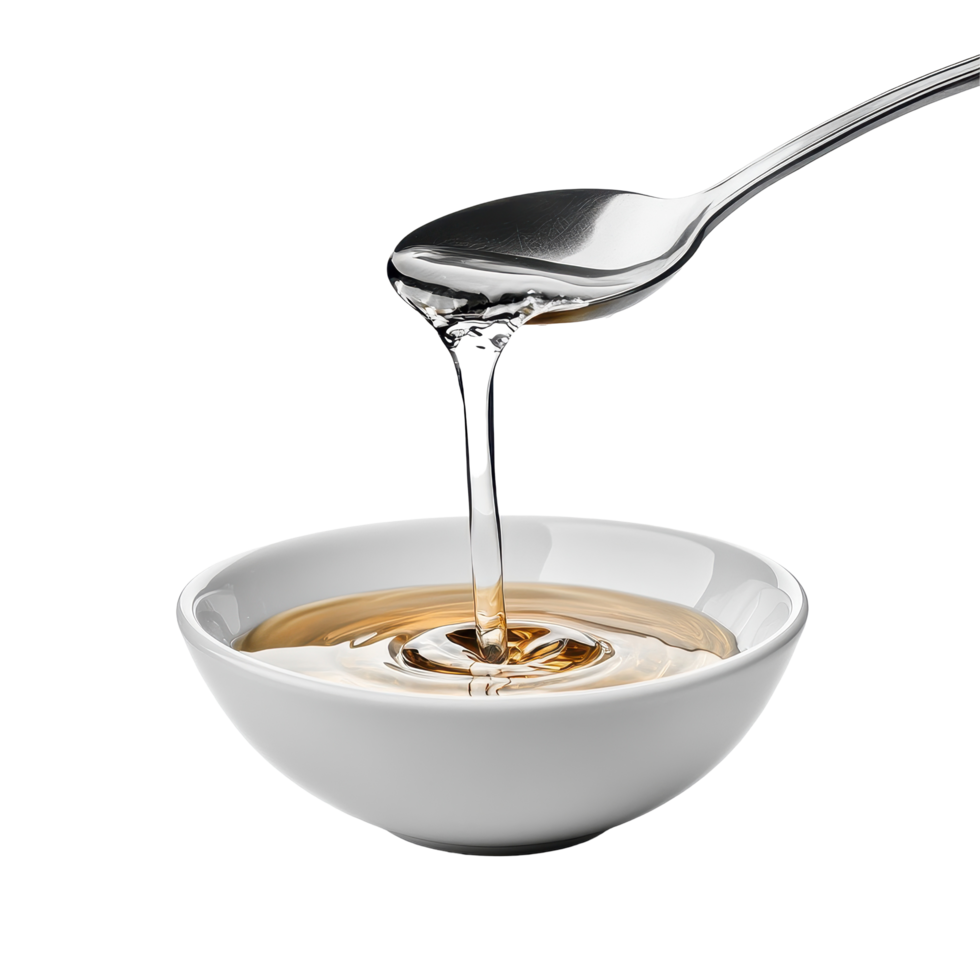 Liquid gracefully pours from a spoon into a pristine white bowl, spoon with liquid pouring out it in a bowl, Transparent background png
