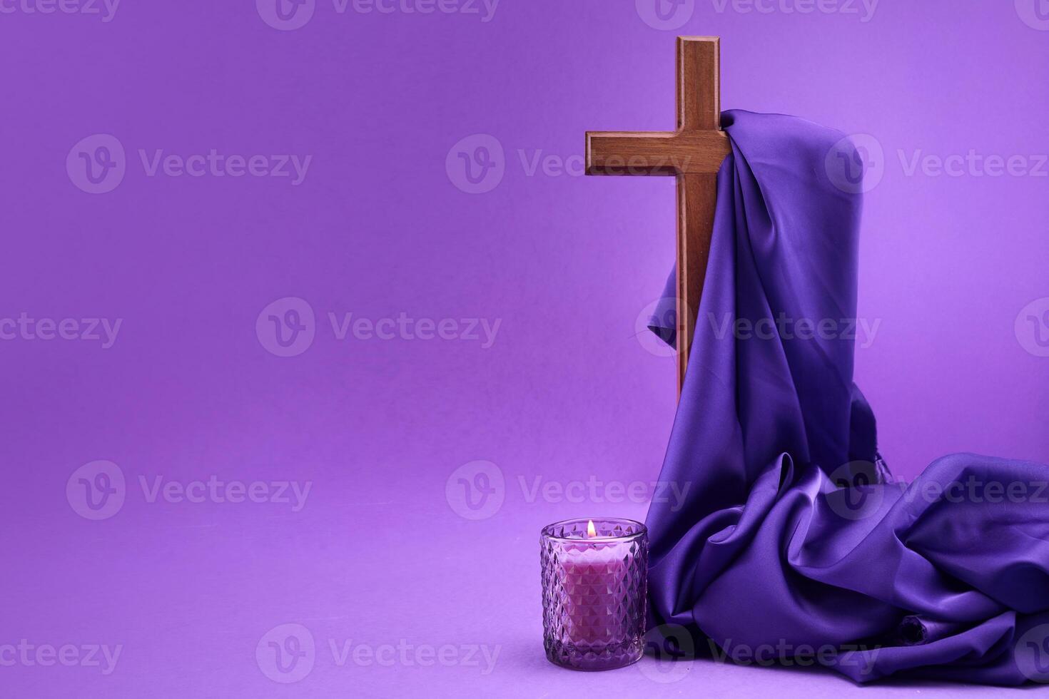 Lent. Purple Serenity. A wooden cross draped with fabric photo