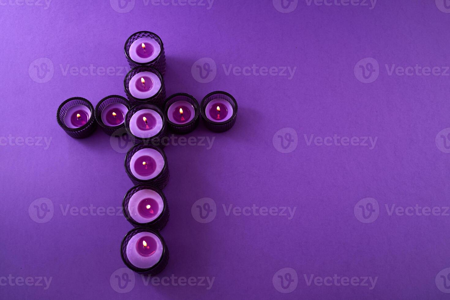 Lent Symbolism. Cross of Purple Candles photo