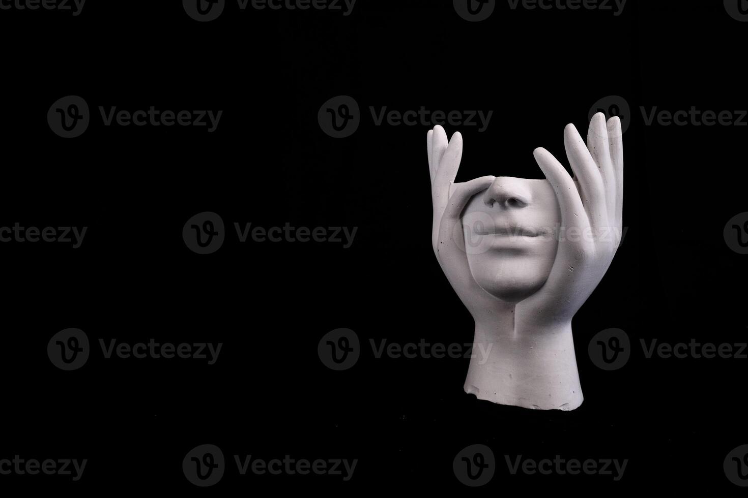 On Black Background With Copy Space Pensive White Statue photo
