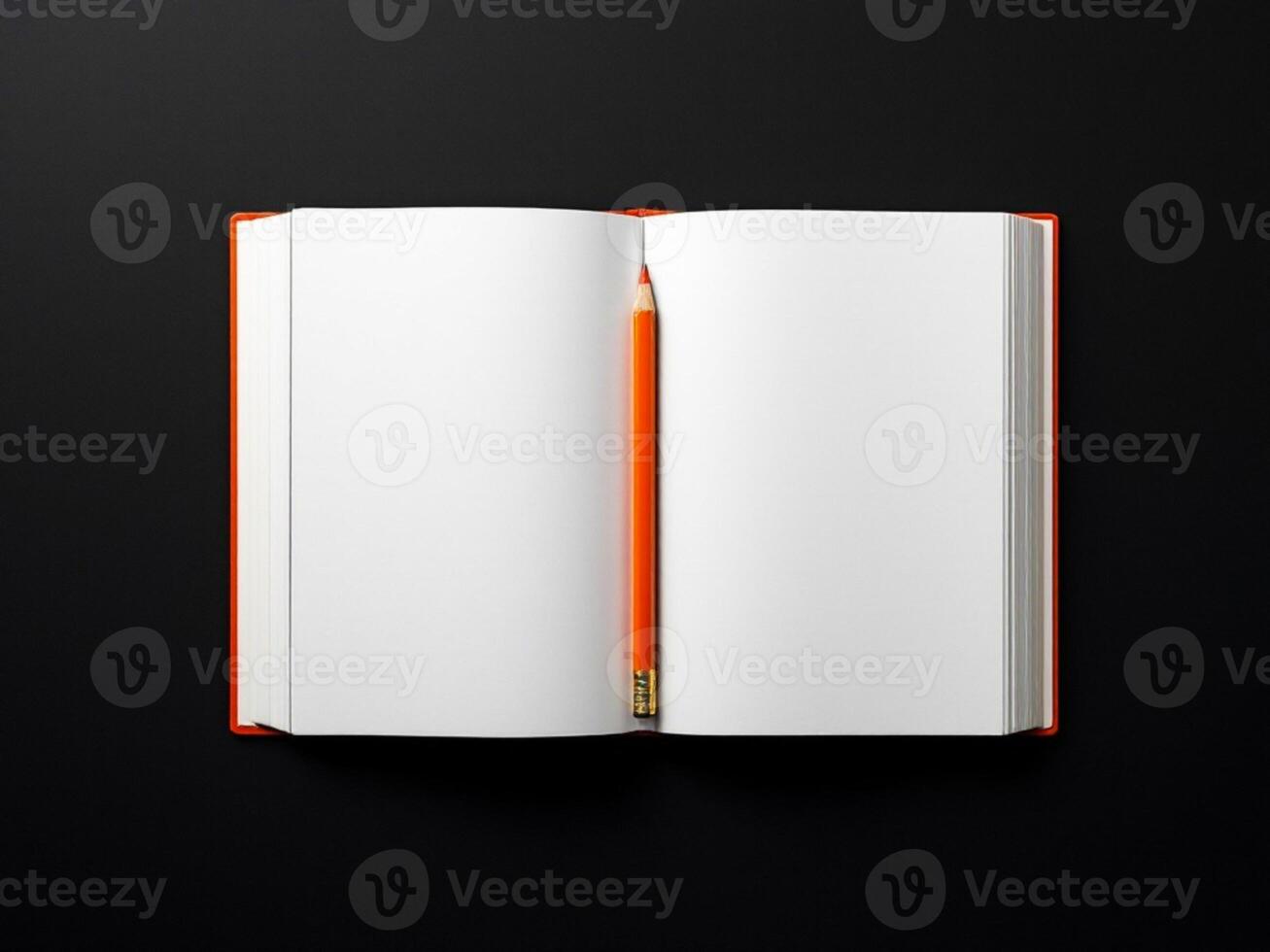 Open book with blank pages and pencil on black background, top view photo