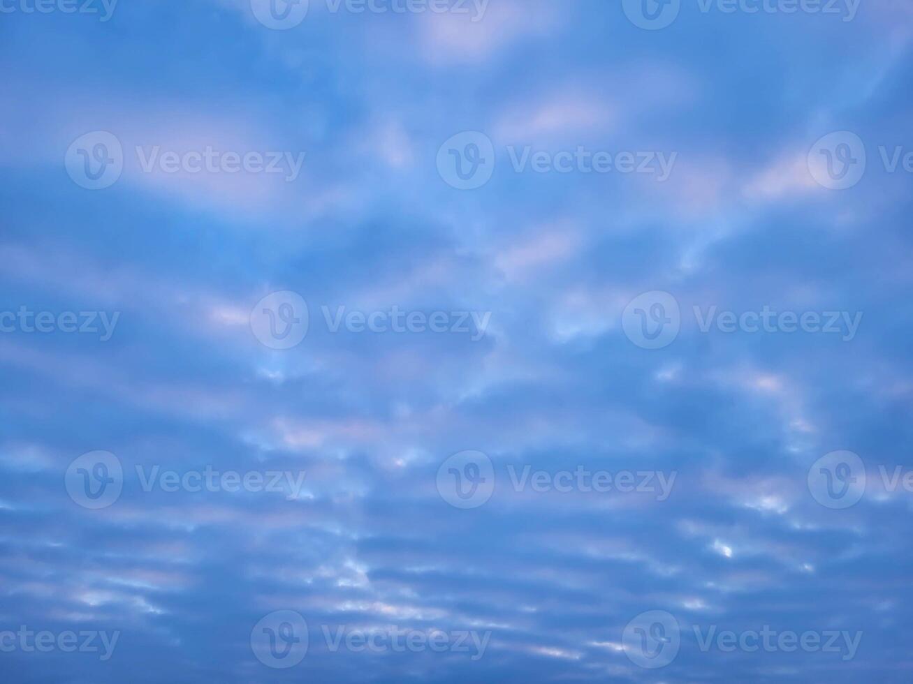 Sky with clouds of blue and pink shades photo