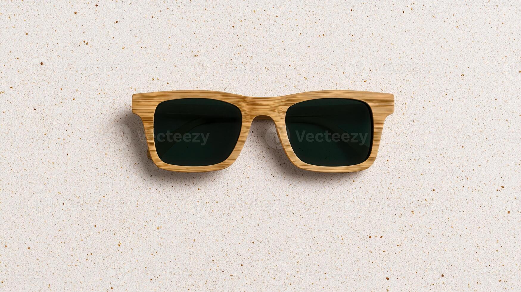Stylish bamboo sunglasses neatly placed on a textured beige background, showcasing modern eco-friendly fashion. photo