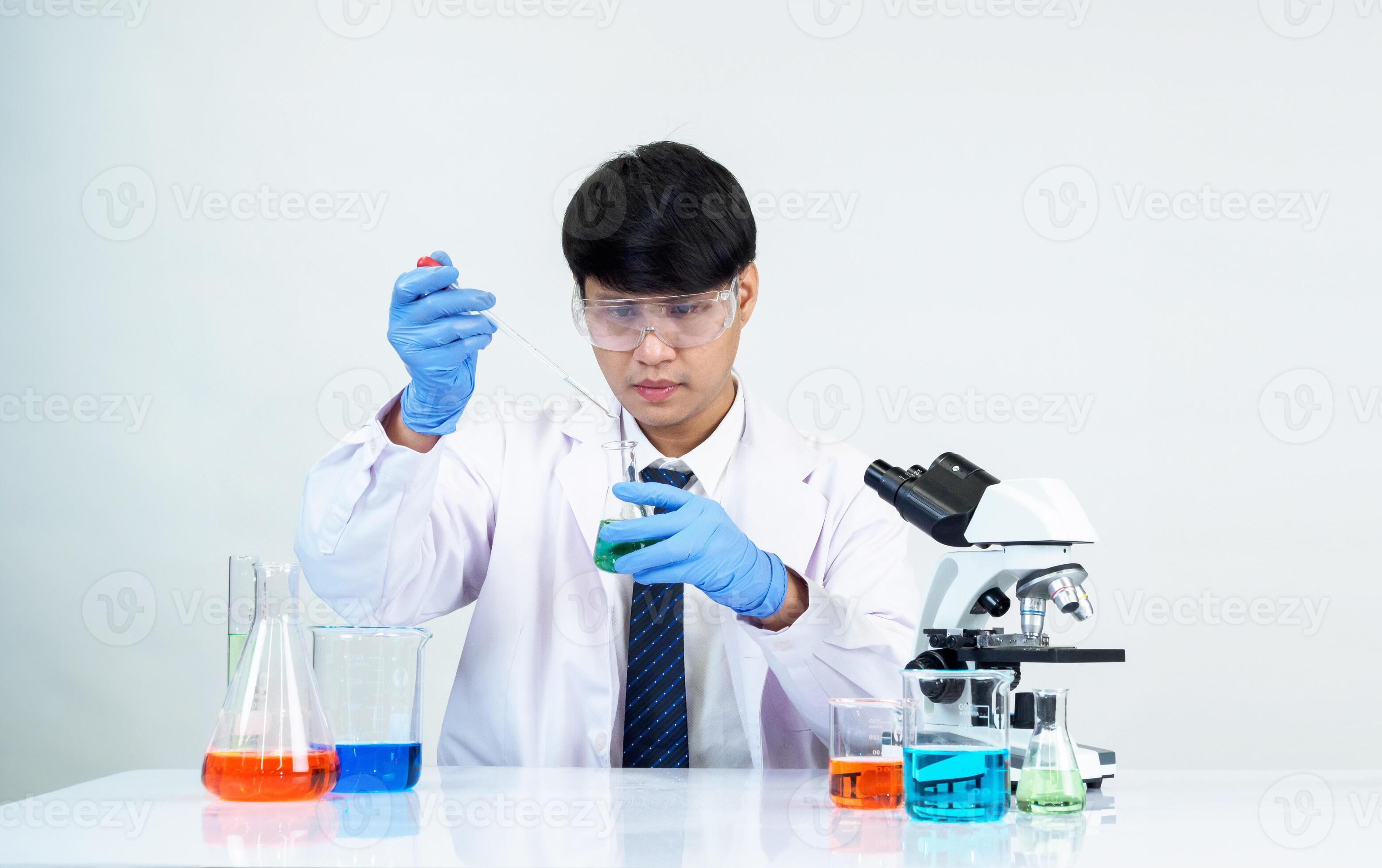 Asian student scientist in reagent mixing laboratory In a science research  laboratory with test tubes of various sizes and microscopes. on the table  in laboratory chemistry lab white background 55934930 Stock Photo at  Vecteezy