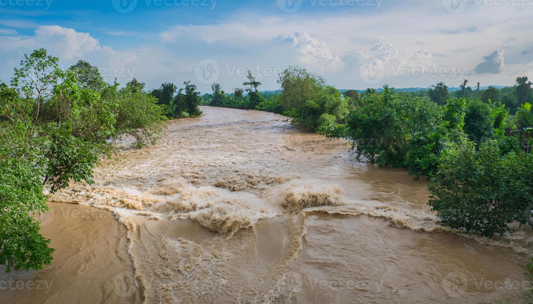 Flooded River Overflowing into Surrounding Areas After Heavy Rain photo