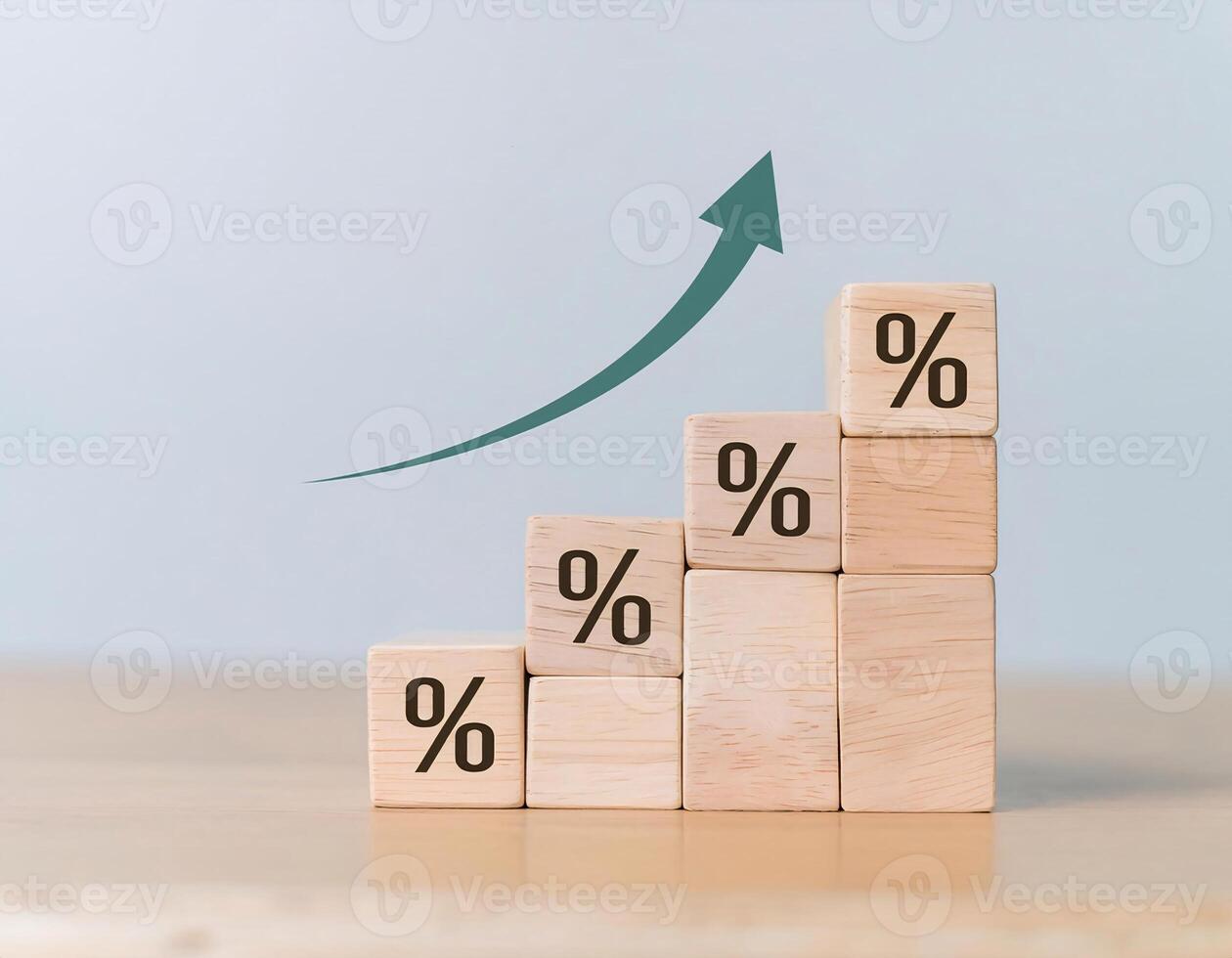 Close-up of Wooden Cubes with Percentage Symbol and Growth Arrows photo