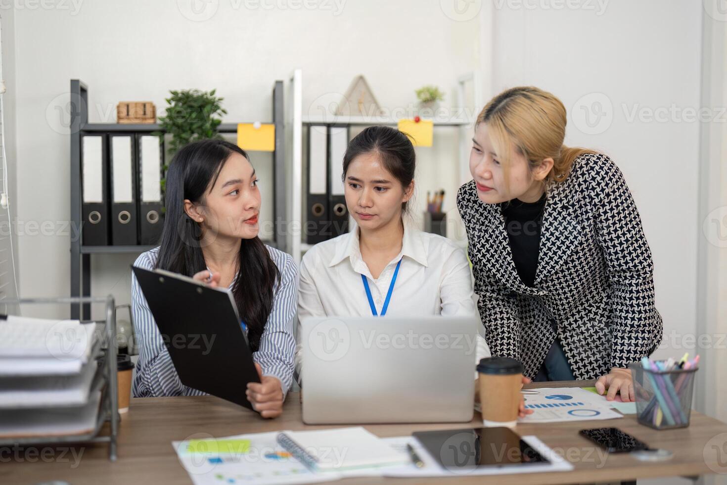 Collaborative business team meeting office professional discussion indoor close-up teamwork dynamics photo