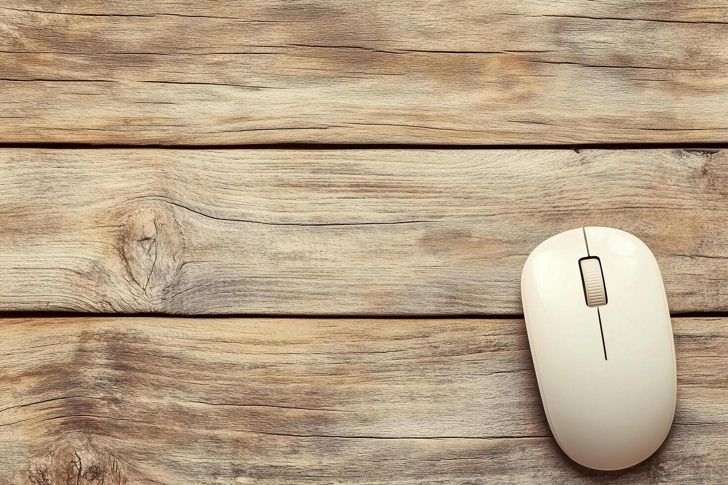 Close-Up of Computer Mouse Positioned on Rustic Wooden Surface with Natural Textures photo