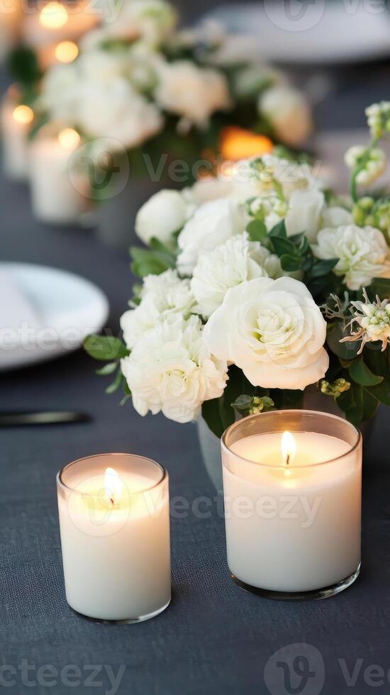 Elegant wedding reception with candlelit tables and white floral arrangements, creating romantic atmosphere. soft glow of candles enhances serene ambiance photo