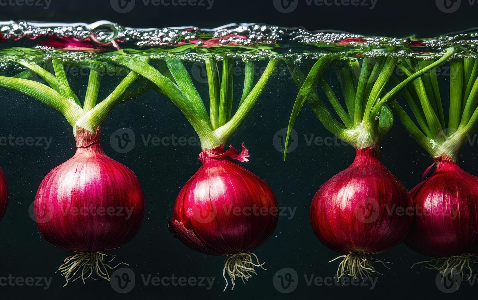 Artistic display of floating red onions in water, showcasing vibrant colors and textures, creating refreshing and lively atmosphere photo