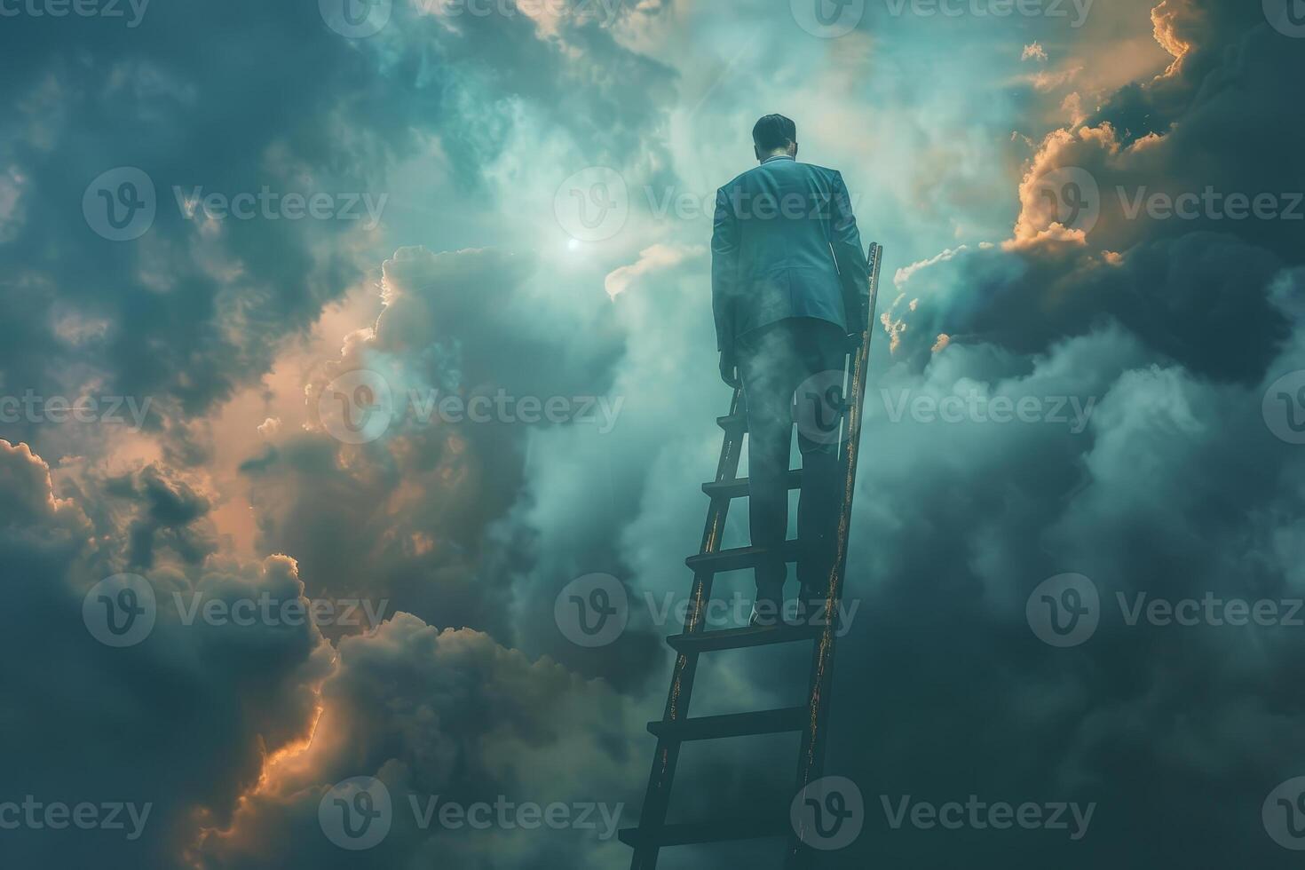 A man in a suit ascends a wooden ladder reaching towards a brilliant light breaking through dark, swirling clouds at twilight, evoking feelings of hope and ambition photo