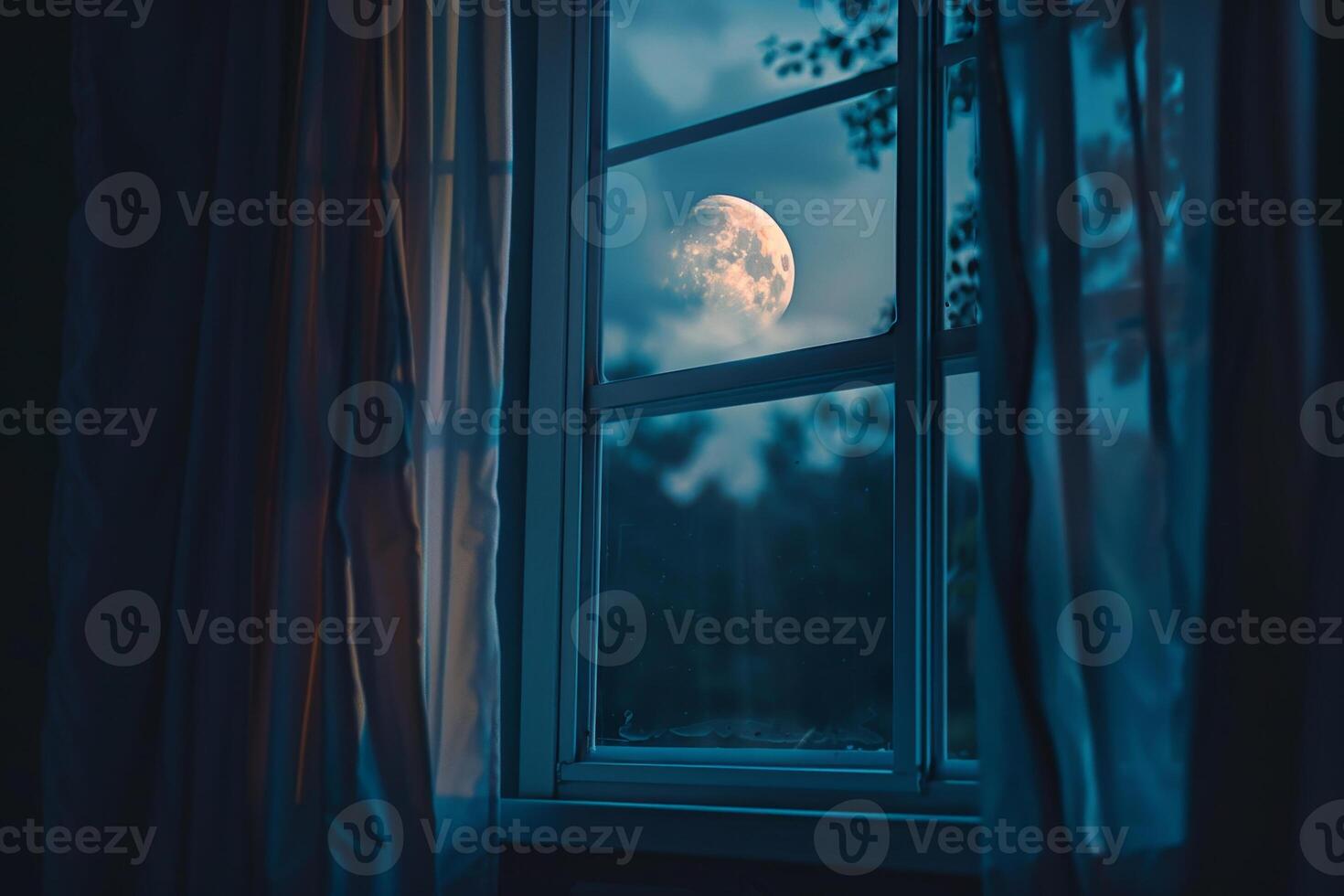 The full moon casts a soft glow through an open window, illuminating the room while delicate curtains flutter in the cool evening breeze photo