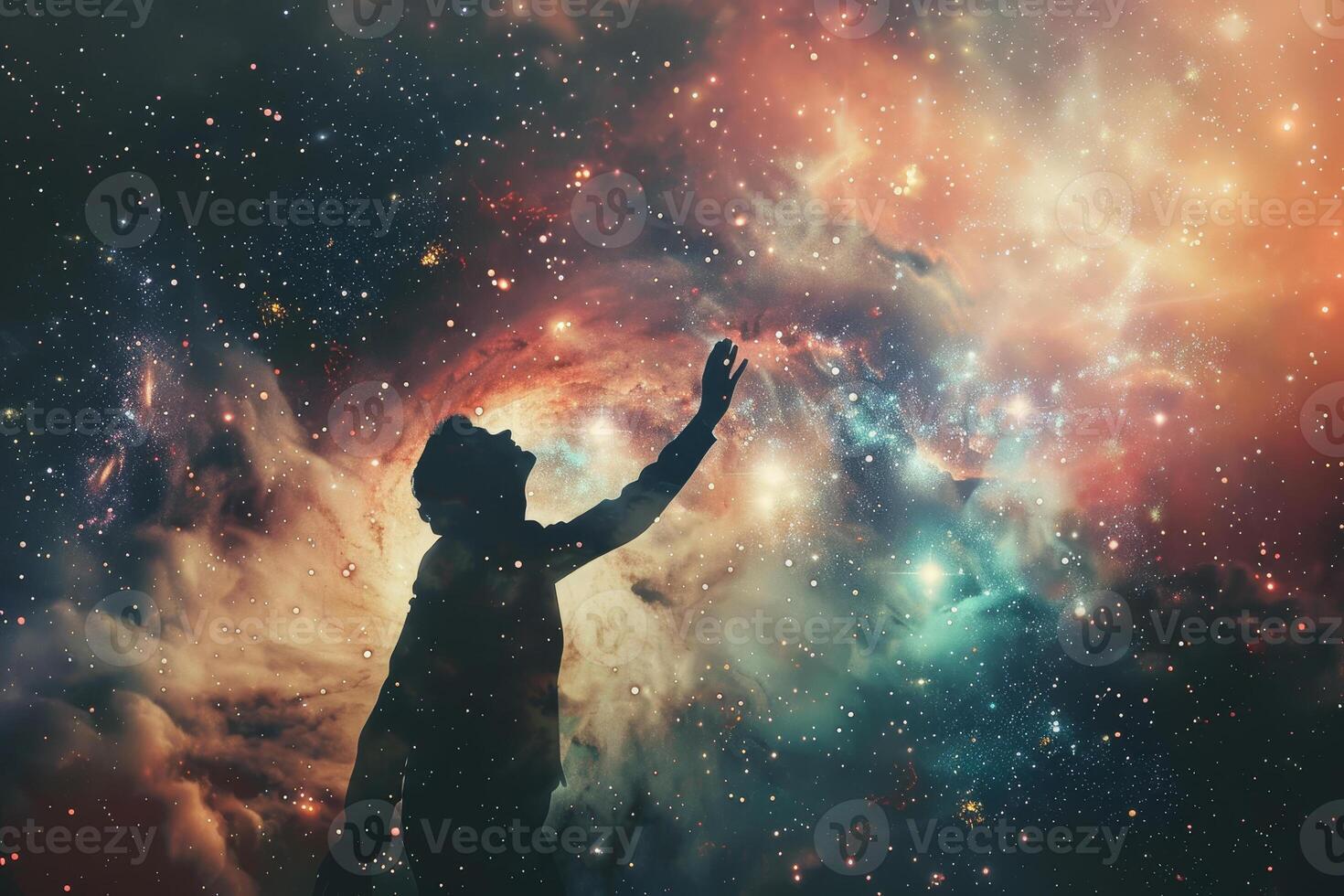 A person reaching up into the space with their hands photo