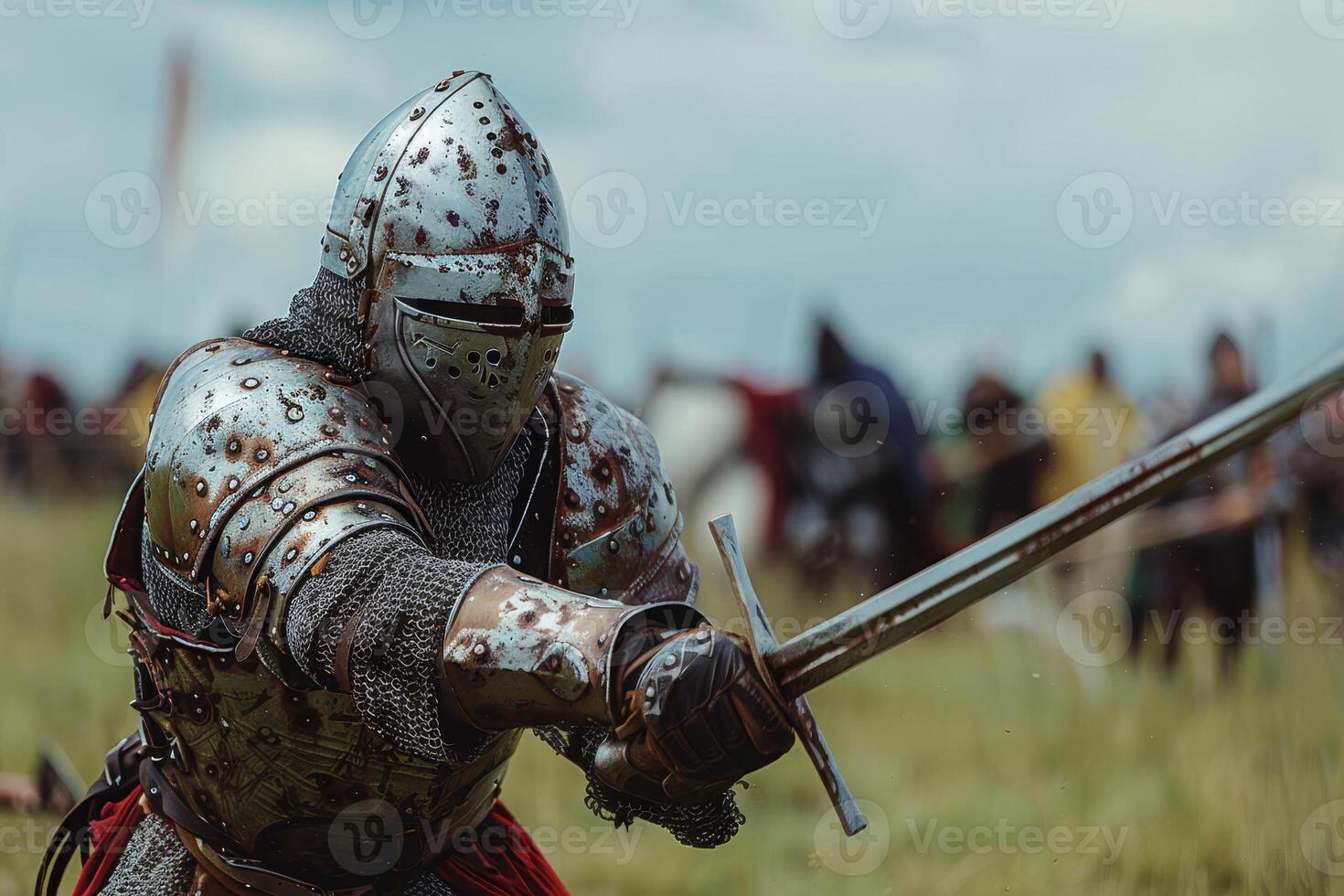 A knight in full armor is holding a sword and is surrounded by other knights photo