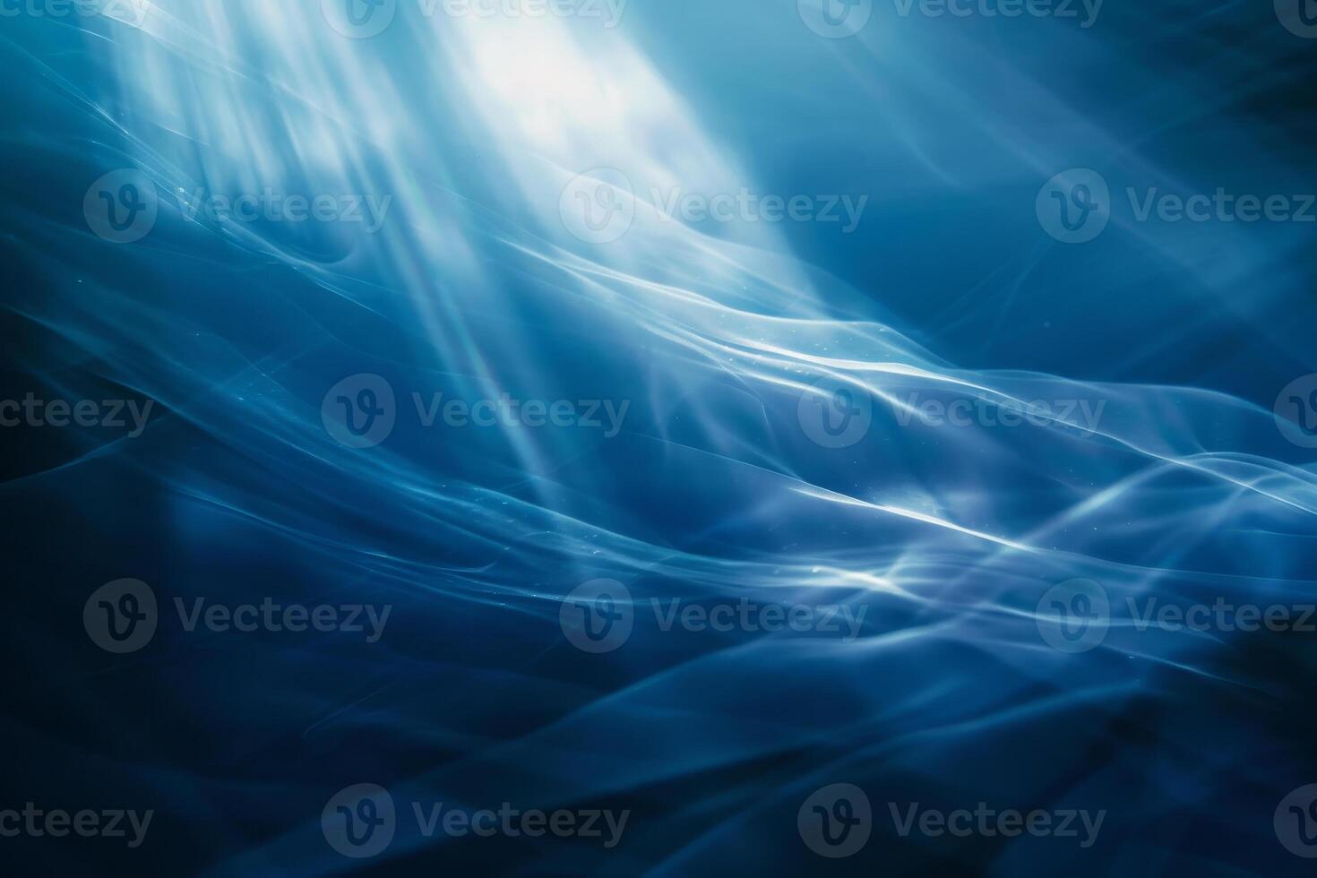 Abstract blue light waves in the ocean photo