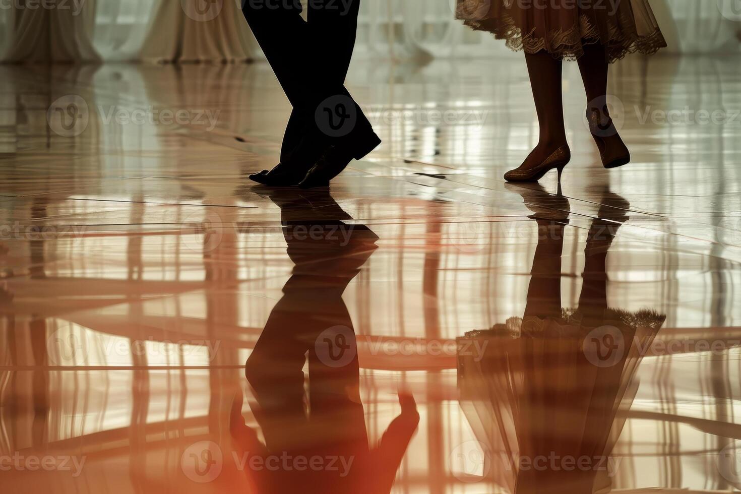 A couple in formal attire standing on a floor photo