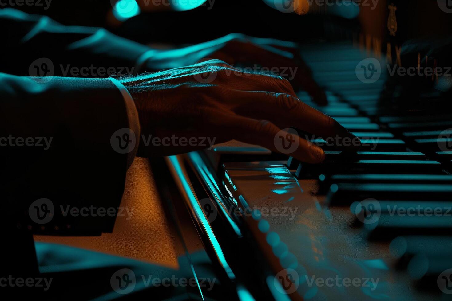 A man in a suit is playing the piano photo