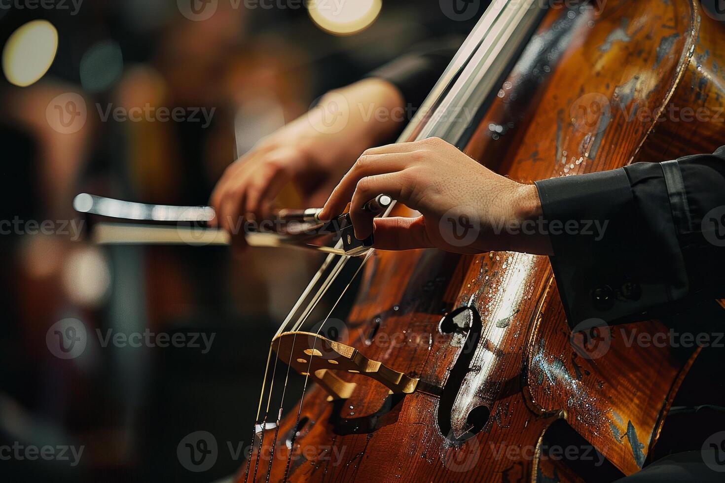 A close up of a cello player's hands photo