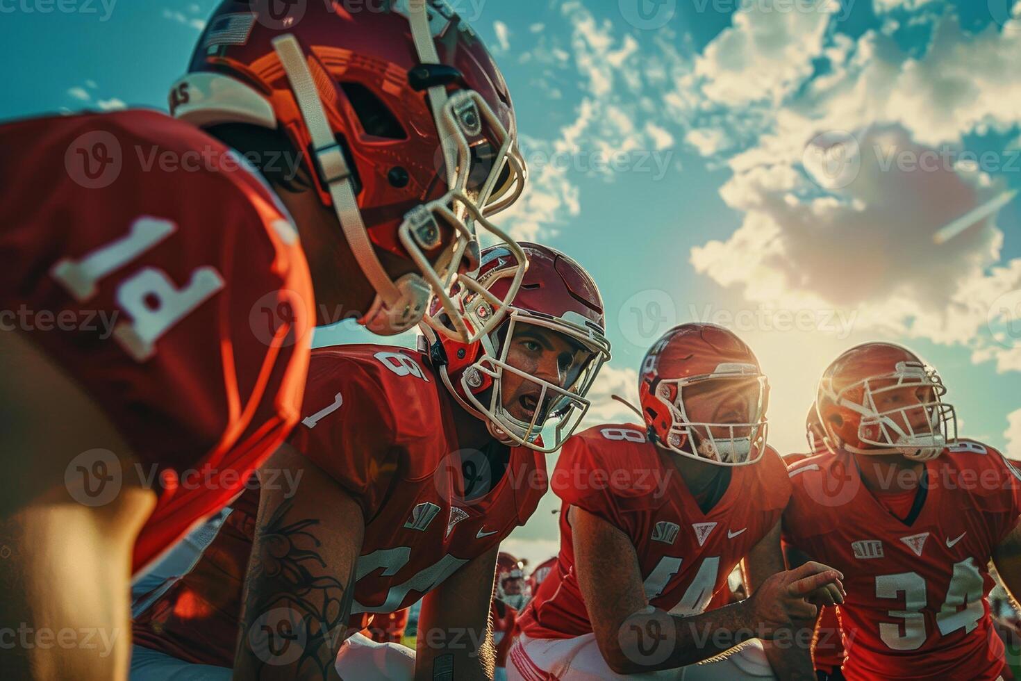 A group of football players in red uniforms photo